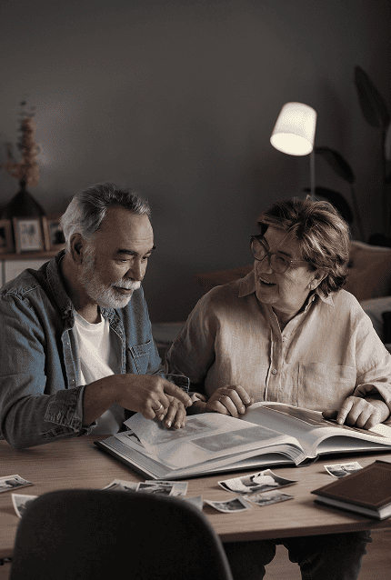 elderly couple going through the documents
